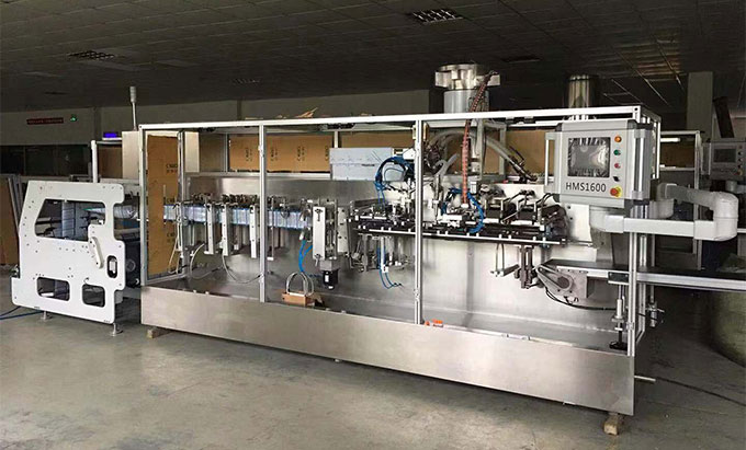 Mini doypack packaging machine for granule, powder, liquid